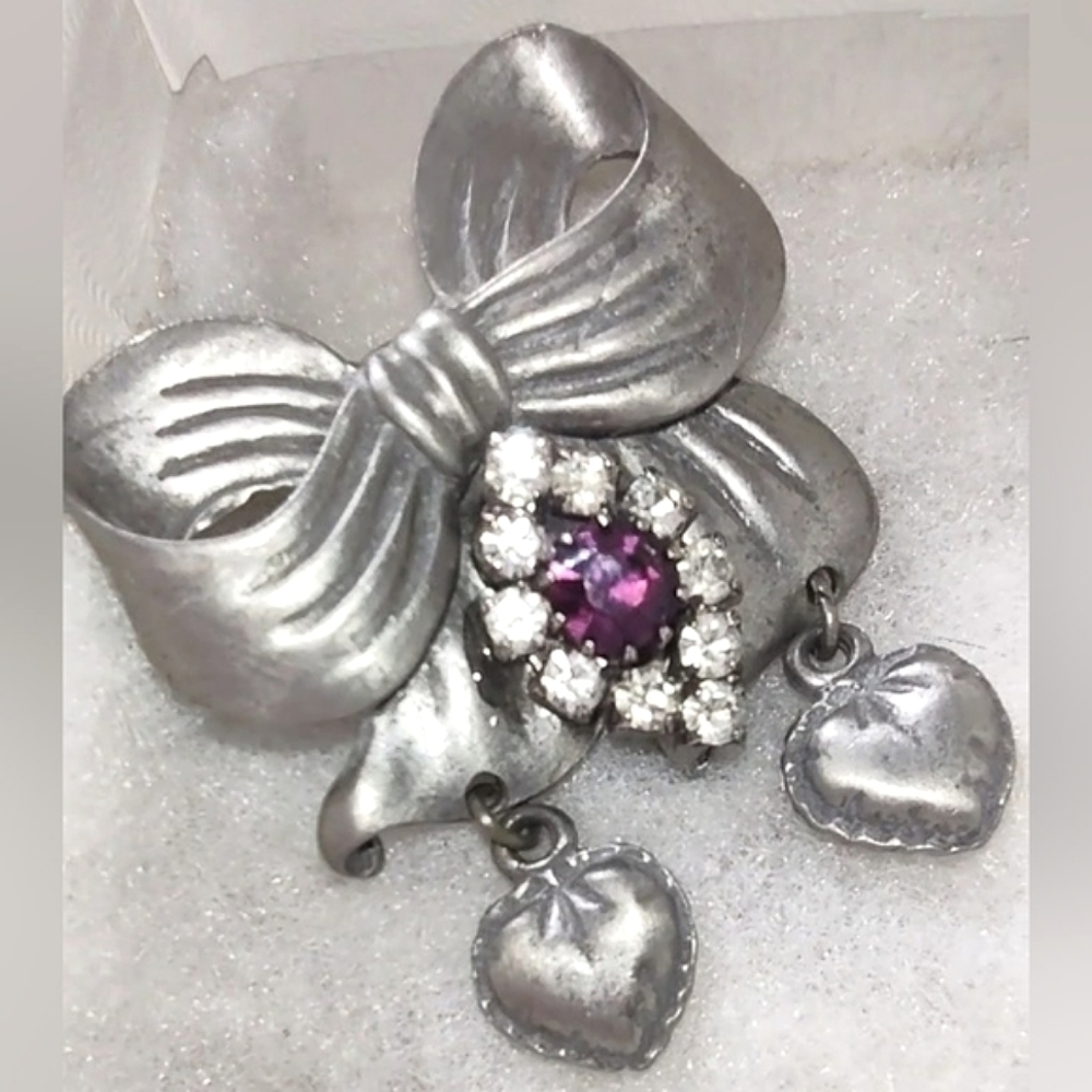 Stamped LCD Pewter Bow Pin from 2006